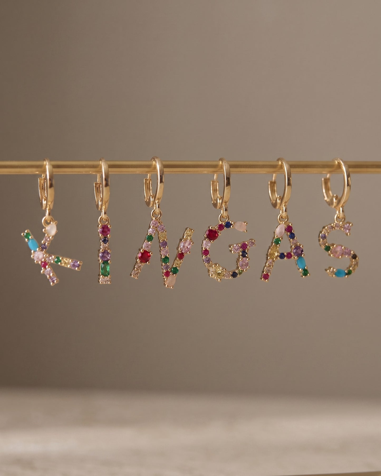 Rainbow Zirconia Initial Huggie Earrings